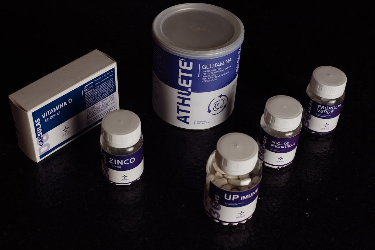 Close-up of a variety of nutritional supplements, vitamins, and probiotics.